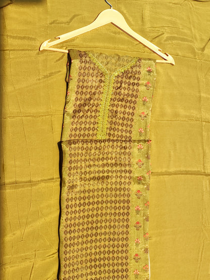 Green printed muslin shirt piece showing print and embroidery detail