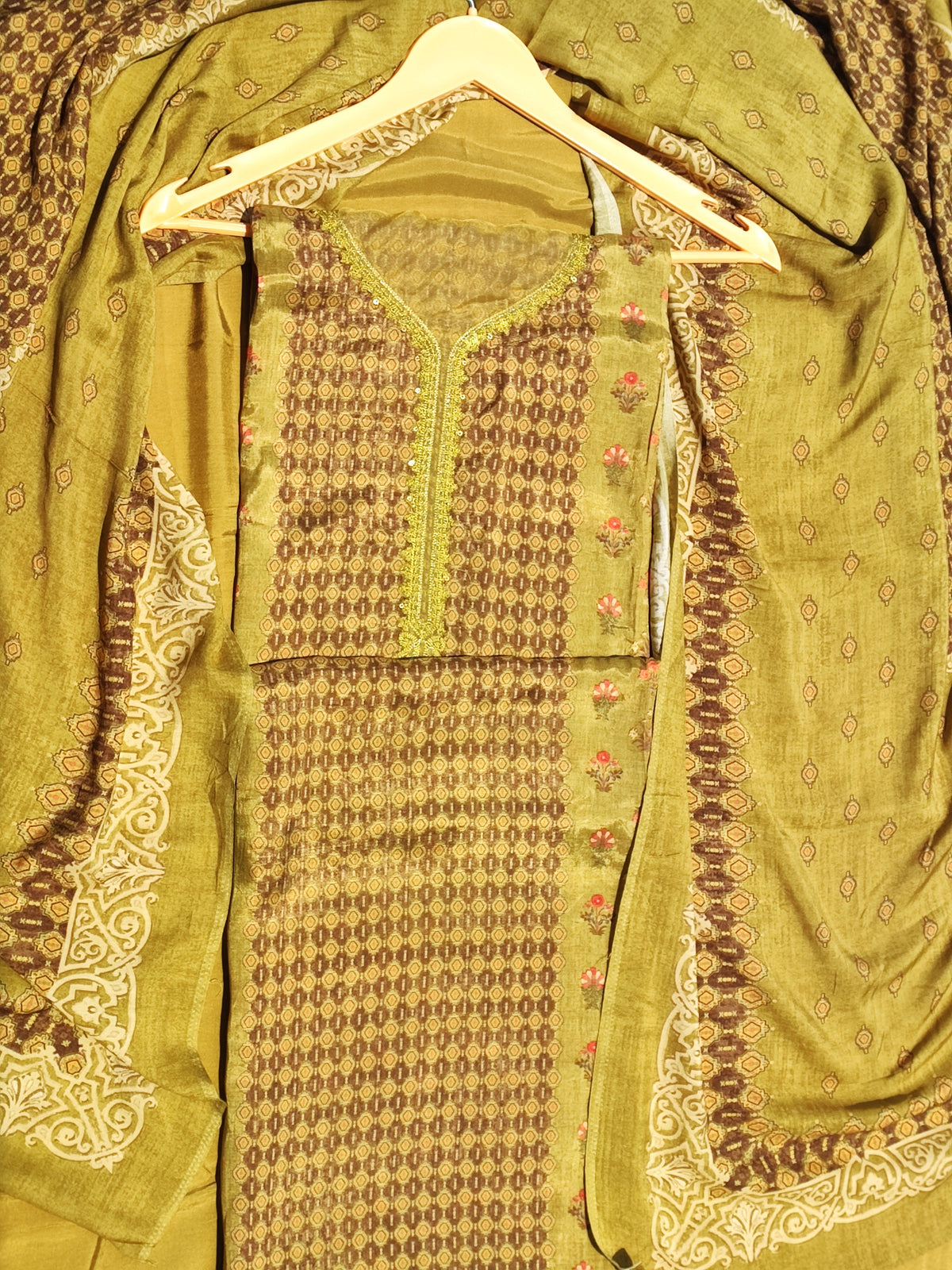 Green muslin dupatta and taffeta bottom from the unstitched suit set