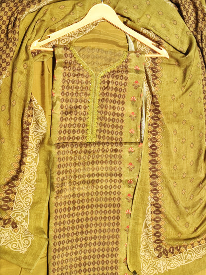 Green muslin dupatta and taffeta bottom from the unstitched suit set