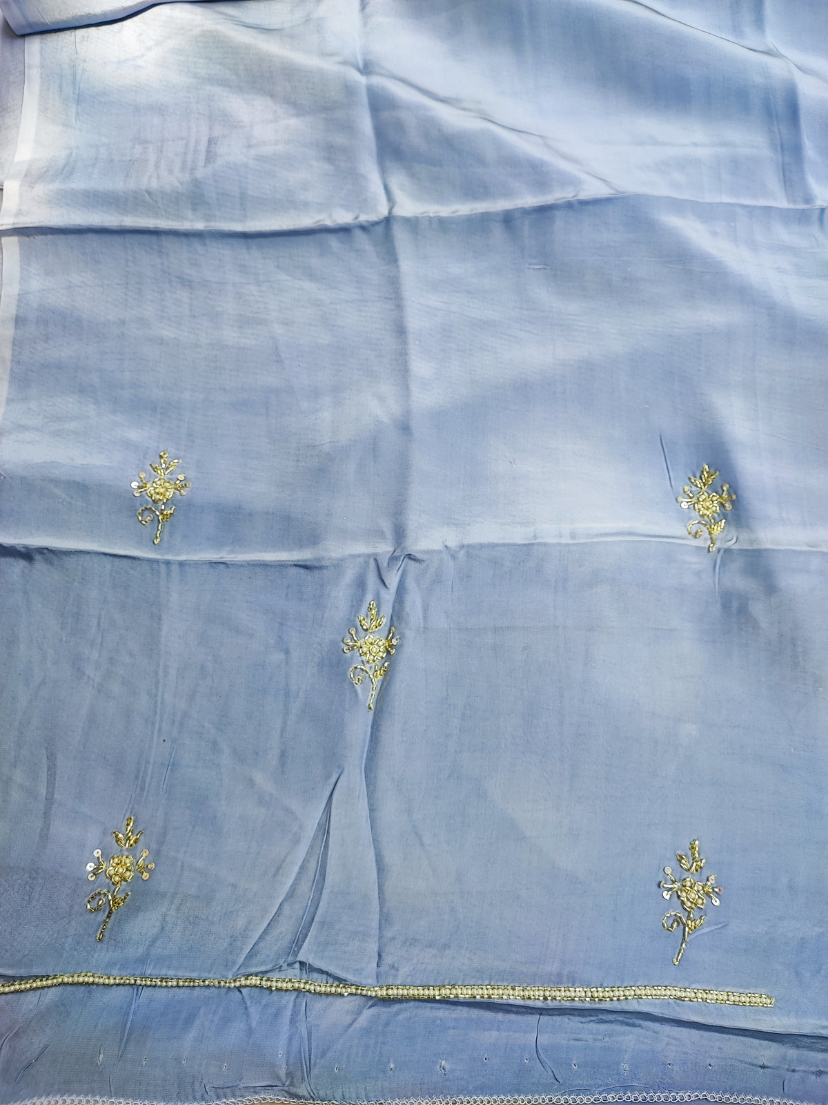 Blue organza dupatta with gold floral hand embroidery and pearl border