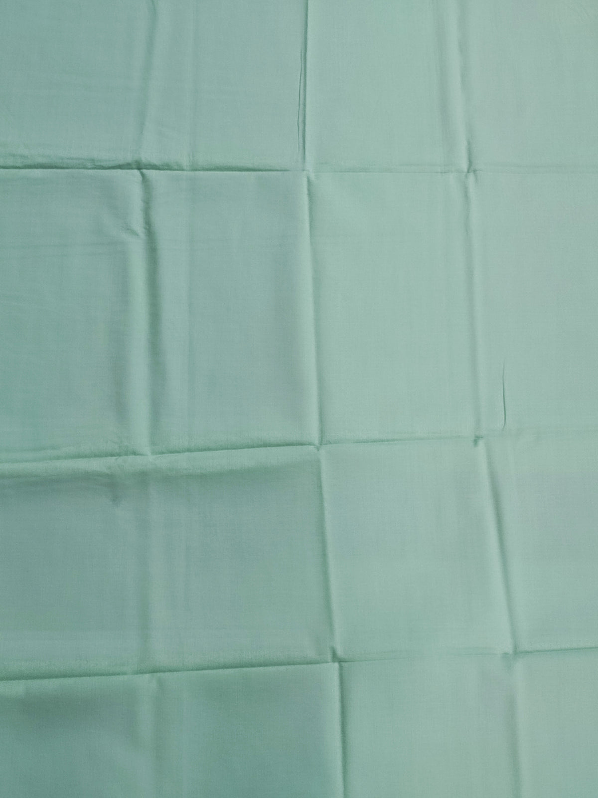 Plain cotton bottom fabric in pastel green