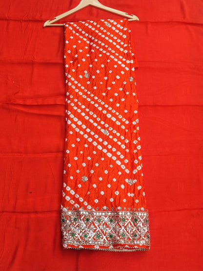 Orange bandhani dupatta in semi gajji silk with four-side gota lace