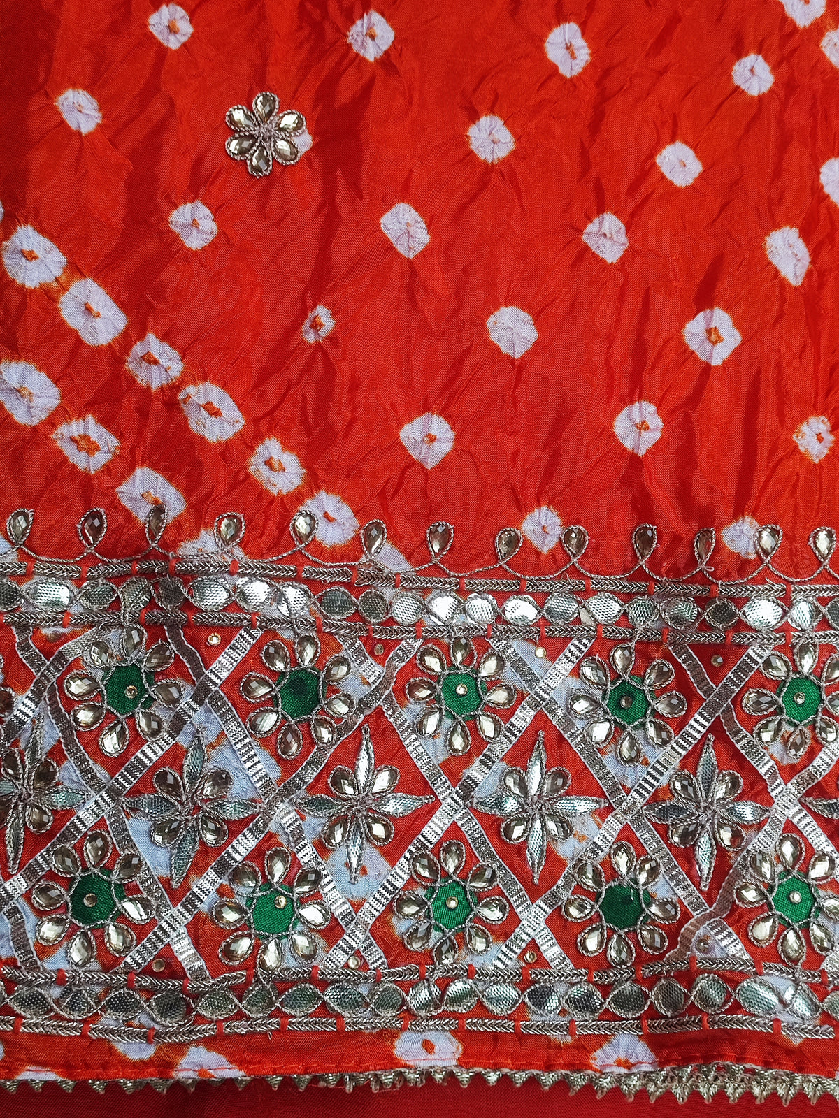 Orange bandhani shirt piece with scattered gota patti flower motifs