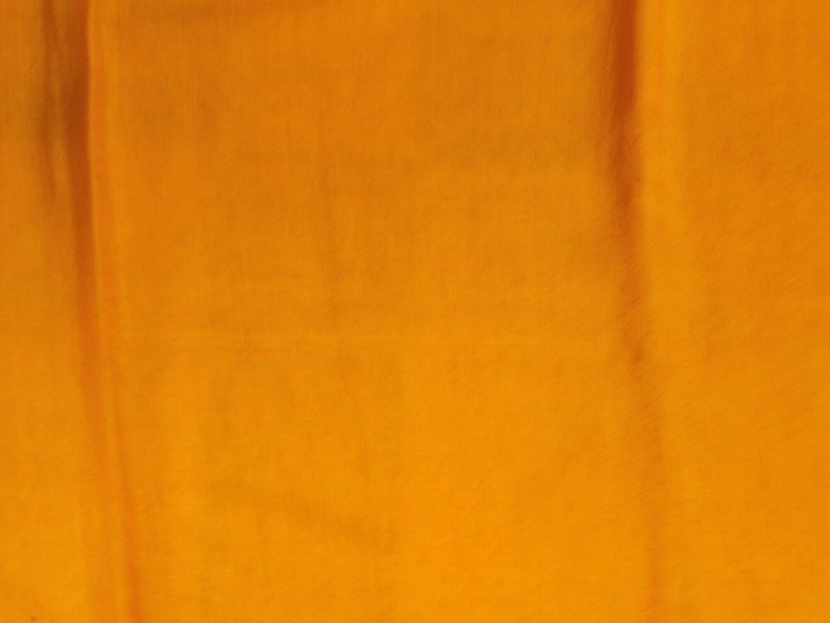 Bandhani tie-dye detail in haldi yellow with white dots