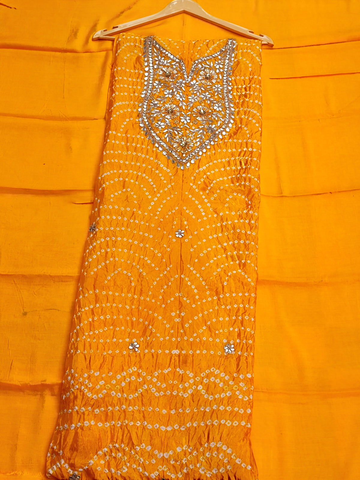 Yellow bandhani shirt piece with gota flower butis for haldi