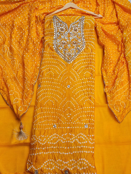 Close-up of gota patti neckline panel on yellow bandhani shirt